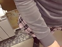 Lifting the skirt for pussy grinding and panty cumshot in public toilet